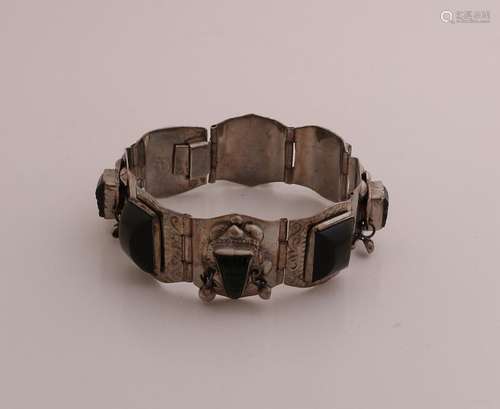 Silver bracelet with stones