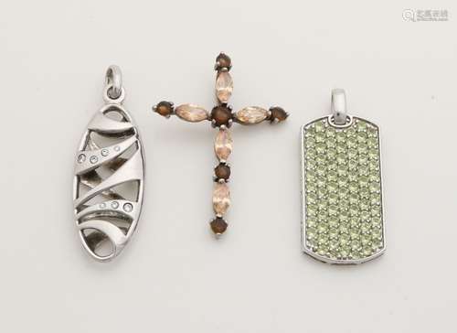 3 silver pendants with stones