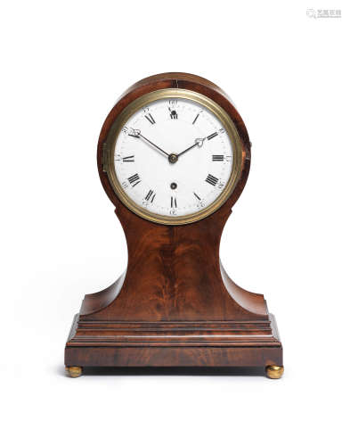 A good early 19th century mahogany balloon-shaped table clock Vulliamy, London, No. 527.