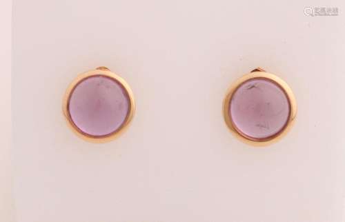 Gold ear studs with amethyst