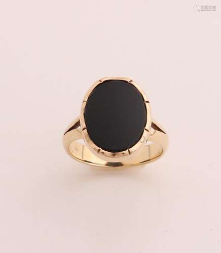 Gold ring with onyx