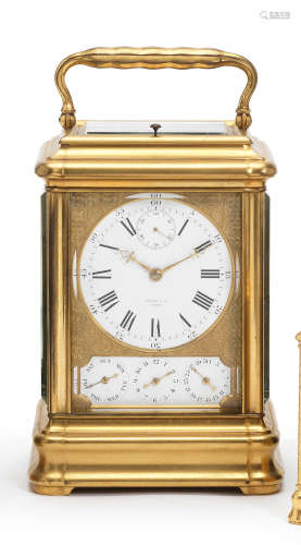 A fine and rare early 20th century French giant, grande sonnerie stiking carriage clock with running seconds, calendar and alarm, with case and original numbered key Made by Drocourt for Tiffany & Co, Geneva, numbered 14547 3