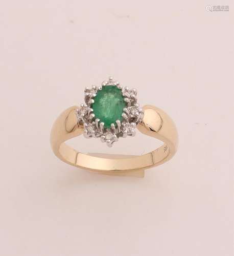 Gold emerald and diamond ring