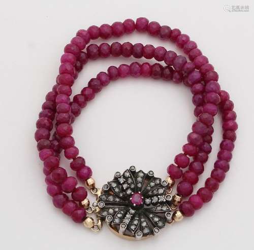 Ruby bracelet with gold clasp with diamond