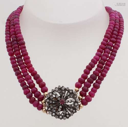 Ruby necklace with gold diamond lock