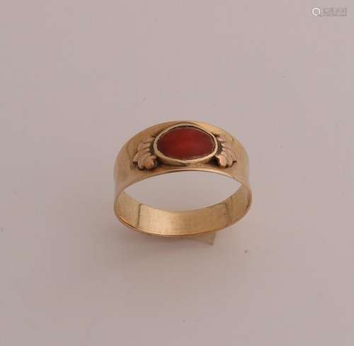 Gold ring with red coral