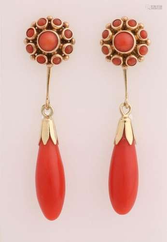 Gold earrings with red coral