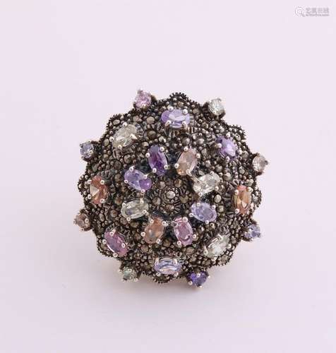 Large silver ring with colored stones