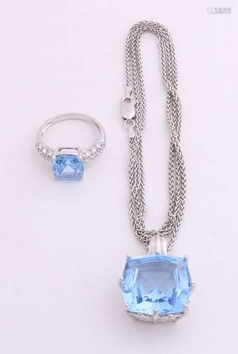 Silver pendant and ring with blue stone