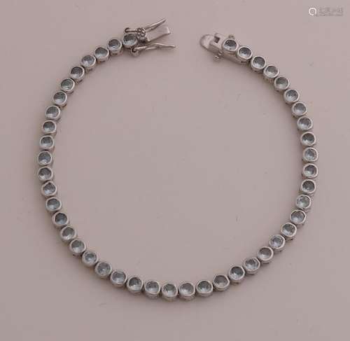 Silver bracelet with blue zirconia's