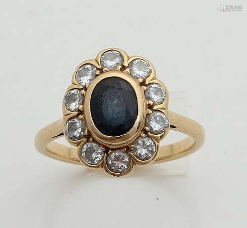 Gold ring with sapphire and diamond