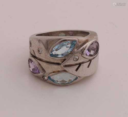 Silver ring with blue topaz and amethyst