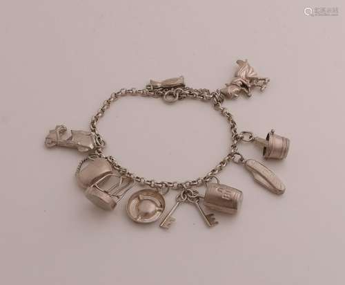 Silver bracelet with charms