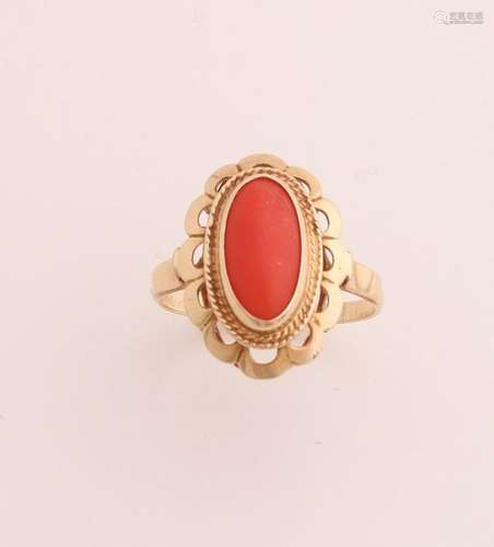 Gold ring with red coral