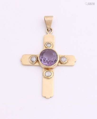 Gold cross with purple stone