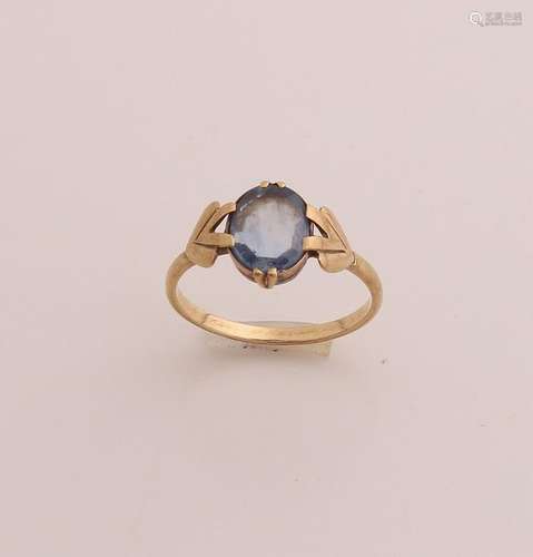 Gold ring with blue stone