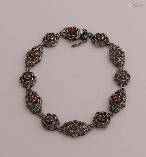 Silver bracelet with red coral