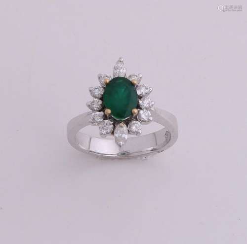 White gold ring with emerald and diamond