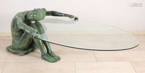 Coffee table with bronze figure