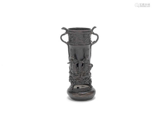 A bronze reticulated cylindrical vessel with integrated stand  Yuan Dynasty