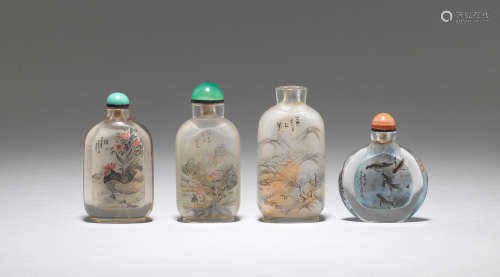 A group of three glass and one rock crystal inside-painted snuff bottles  20th century