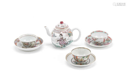 A group of three famille rose tea cups and saucers and a teapot and cover  18th century