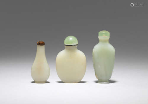 Three pale green jade snuff bottles  18th/19th century