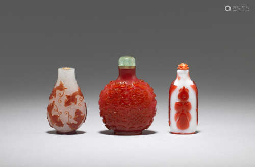 Three red overlay glass snuff bottles  19th century