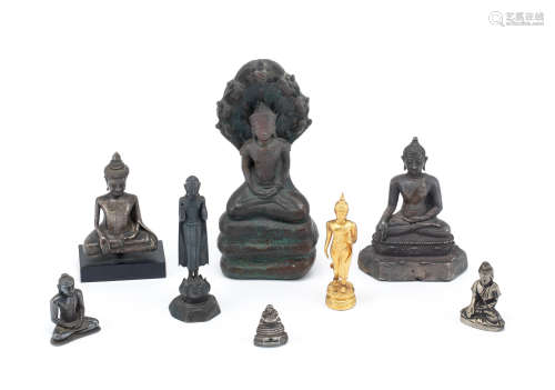 A group of eight various copper-alloy and yellow metal figures of Buddha  Cambodia, Burma and Thailand, probably 19th century and later