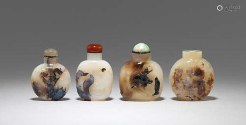 A group of four 'shadow agate' snuff bottles  19th/20th century