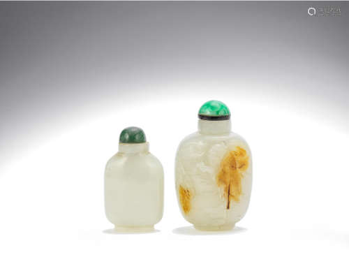 A white and russet jade snuff bottle and a white jade bottle  20th century
