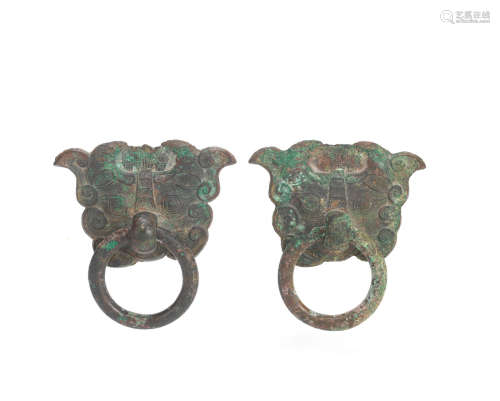 A pair of bronze 'mask and loose ring' fittings   Warring States/ Western Han Dynasty
