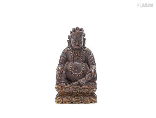 A carved wood figure of Kubera  Tibet, probably 19th century