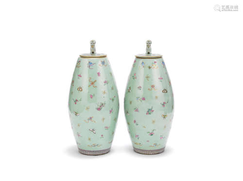 A pair of famille rose celadon ground jars and covers  19th century