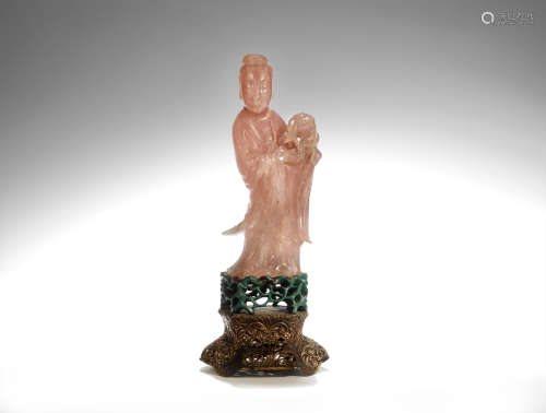 A large rose quartz carving of Guanyin  Late Qing Dynasty