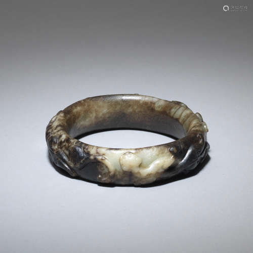 A black and white jade 'chilong' bangle  Ming Dynasty