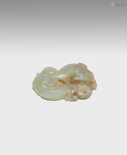 A green and russet jade 'carp' group  17th century