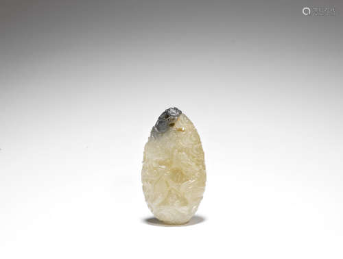 A WHITE AND BLACK JADE 'DRAGON AMONG CLOUDS' PENDANT and a pale green jade 'chilong' bi