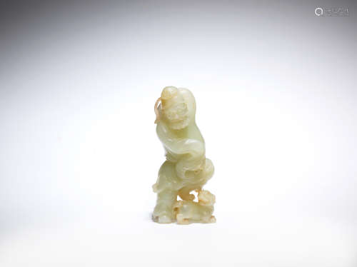 A pale green jade 'foreigner' carving