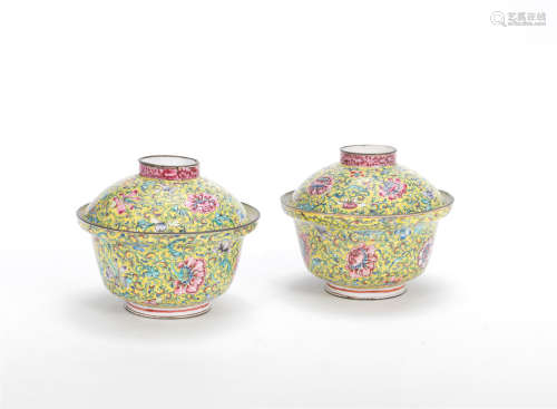 A pair of painted enamel yellow ground bowls and covers  18th century