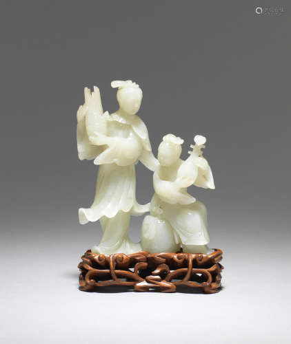 A pale green jade carving of female musicians  Republic Period