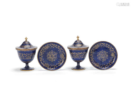 A pair of rare gilt-decorated blue enamel covered stem cups and stands  18th century