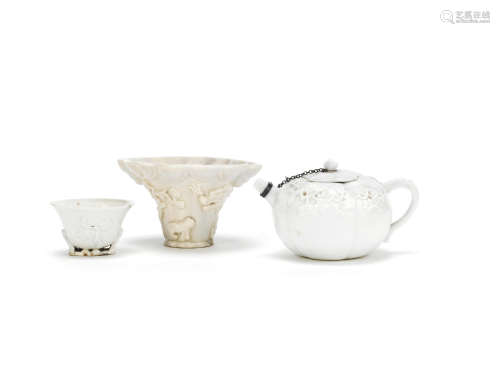 A blanc-de-chine teapot and cover, a blanc-de-chine cup, and a libation cup   17th-18th century
