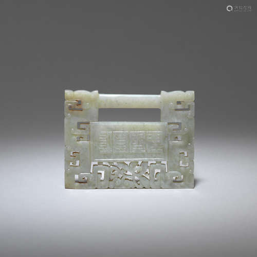 A pale green jade 'lock' pendant  19th century