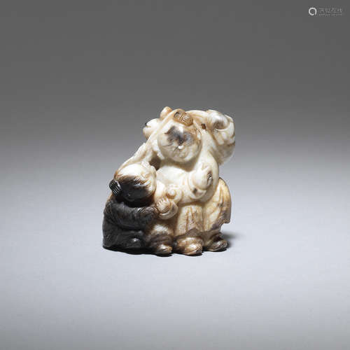 A chicken bone jade 'HeHe Erxian' group  17th/18th century