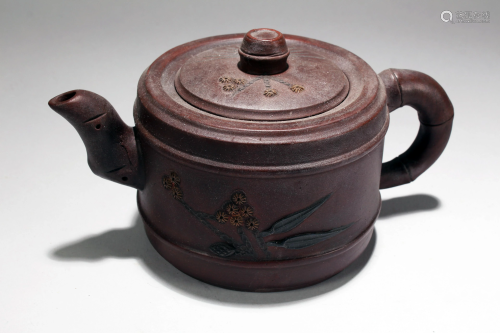 A Chinese Circular Tea Pot Display