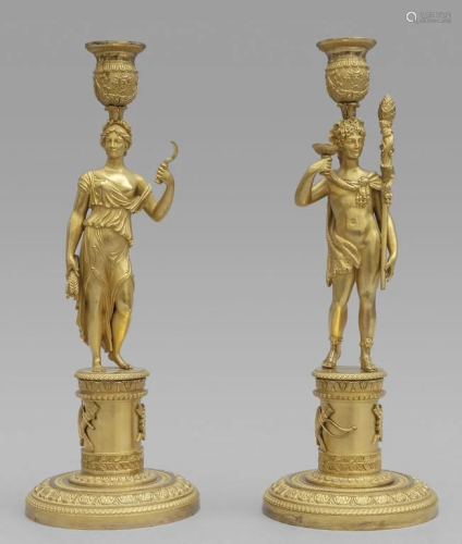 Coppia di candelabri in bronzo dorato