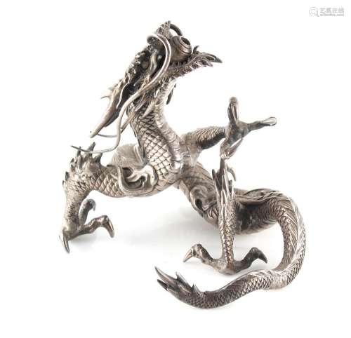 Property of a gentleman - a Japanese white metal table lighter modelled as a dragon, Meiji period (