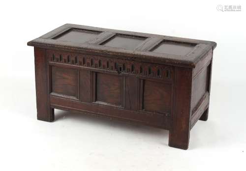 Property of a deceased estate - a small 17th century oak coffer with nulled frieze, replacement back