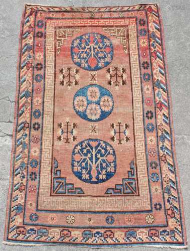 Property of a deceased estate - a late 19th / early 20th century Khotan rug, 91 by 54ins. (231 by